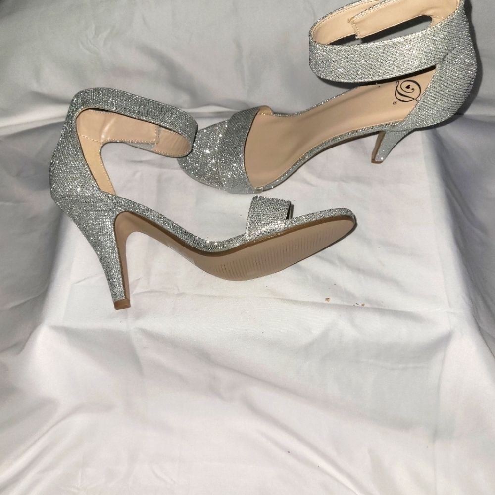 Silver glitter heels open toes.